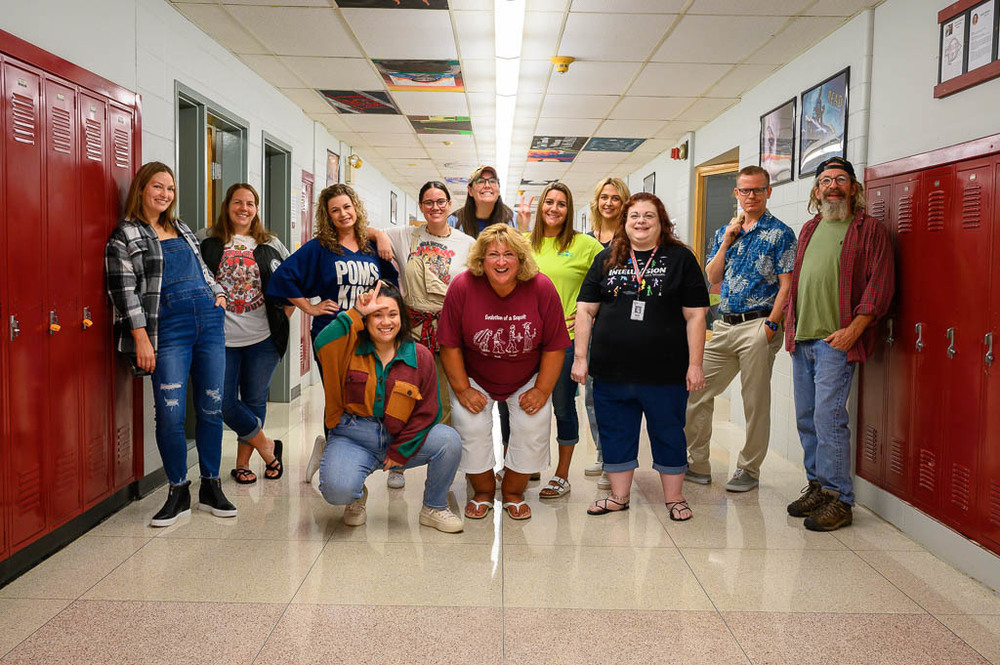 The English department poses for decade day.
