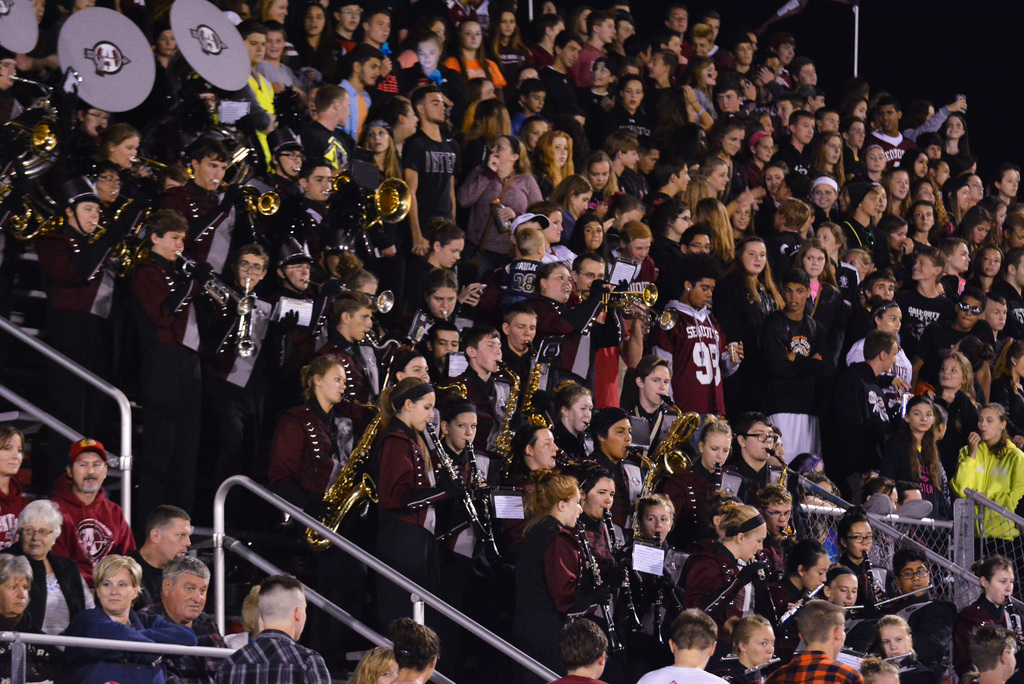 Pep band playing at a football game in 2015